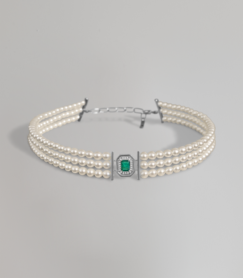 Eugenia white pearl and emerald necklace